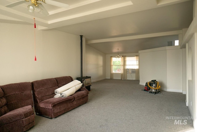 living room with carpet and ceiling fan with notable chandelier