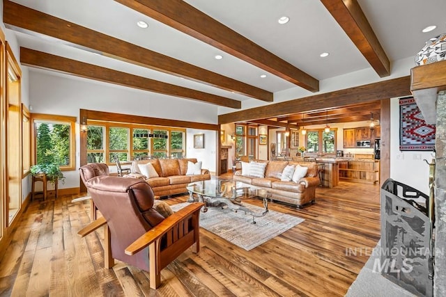 1418 Club Hill Blvd, Mccall, ID 83638 - living area with beamed ceiling, light wood-type flooring, plenty of natural light, recessed lighting, and baseboards