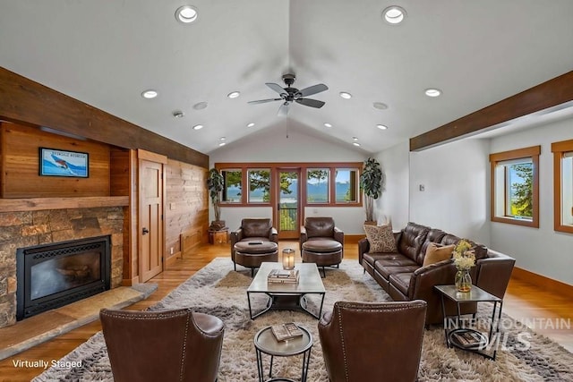 1418 Club Hill Blvd, Mccall, ID 83638 - living area featuring a glass covered fireplace, wood finished floors, recessed lighting, ceiling fan, and vaulted ceiling