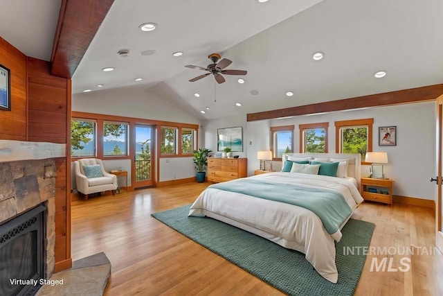 1418 Club Hill Blvd, Mccall, ID 83638 - bedroom featuring a fireplace with raised hearth, baseboards, vaulted ceiling, access to exterior, and recessed lighting