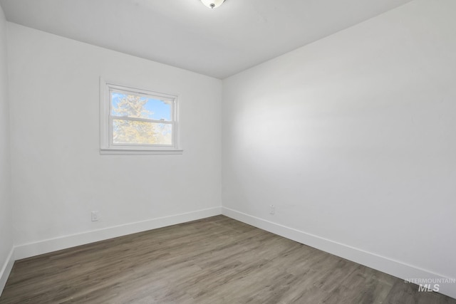 923 13th St S, Nampa, ID 83651 - unfurnished room featuring baseboards and wood finished floors