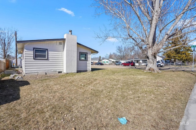 923 13th St S, Nampa, ID 83651 - view of property exterior with a chimney and crawl space