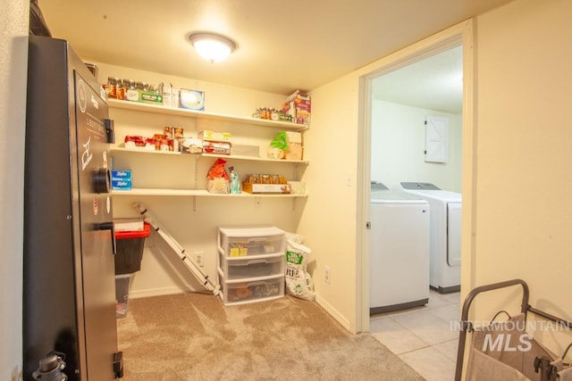 interior space with washing machine and dryer