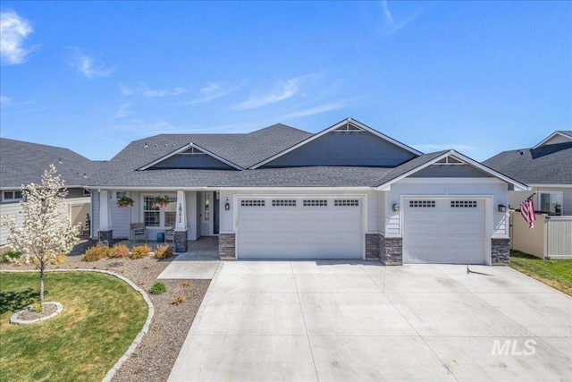 18272 N Wild Goose Ave, Nampa, ID 83687 - craftsman-style home featuring an attached garage, concrete driveway, stone siding, a porch, and a shingled roof