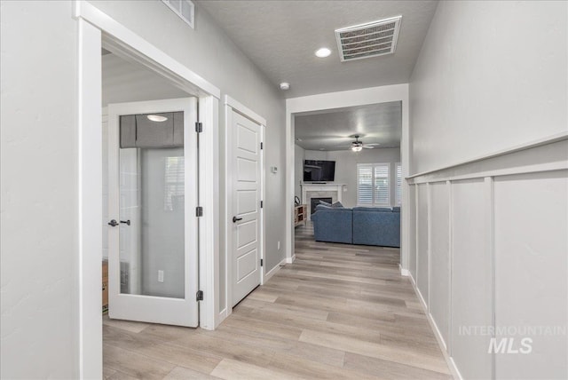 18272 N Wild Goose Ave, Nampa, ID 83687 - hall with light wood-style floors and recessed lighting
