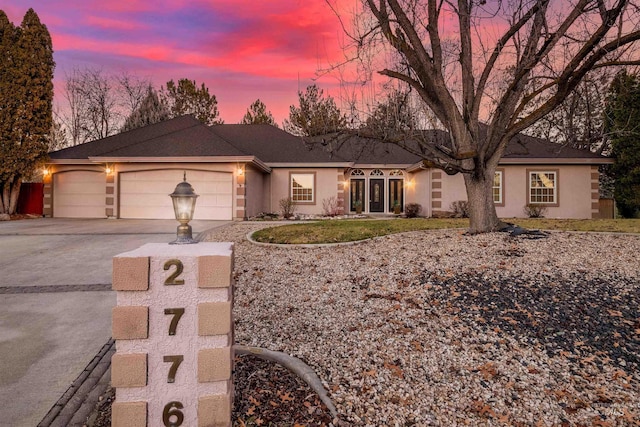 single story home with a garage