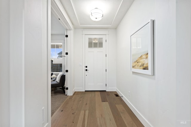 7766 W Daybreak Run Ct, Meridian, ID 83646 - foyer entrance featuring hardwood / wood-style flooring and baseboards