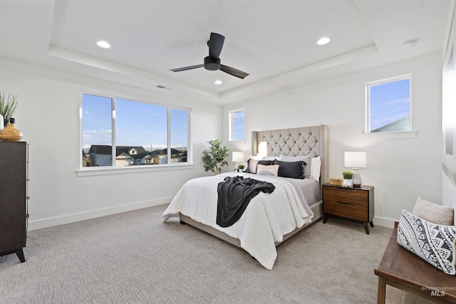 7766 W Daybreak Run Ct, Meridian, ID 83646 - bedroom featuring a tray ceiling, recessed lighting, a ceiling fan, and light colored carpet
