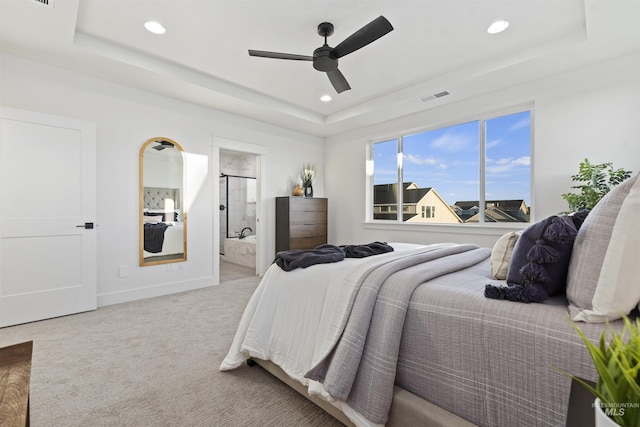 7766 W Daybreak Run Ct, Meridian, ID 83646 - bedroom with a raised ceiling, carpet floors, recessed lighting, ceiling fan, and connected bathroom