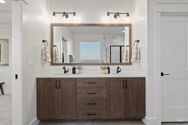 7766 W Daybreak Run Ct, Meridian, ID 83646 - bathroom featuring double vanity, a shower stall, and backsplash