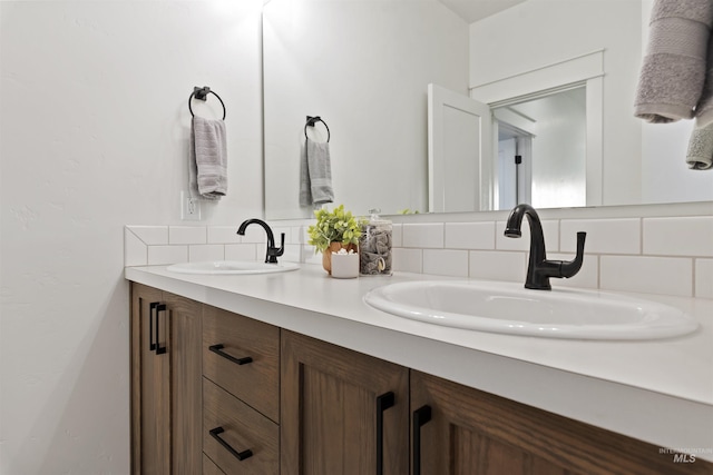 7766 W Daybreak Run Ct, Meridian, ID 83646 - bathroom with double vanity and backsplash
