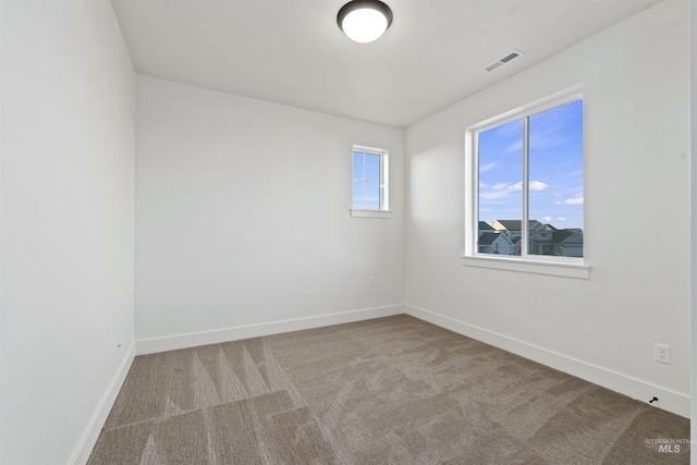 7766 W Daybreak Run Ct, Meridian, ID 83646 - carpeted spare room with baseboards