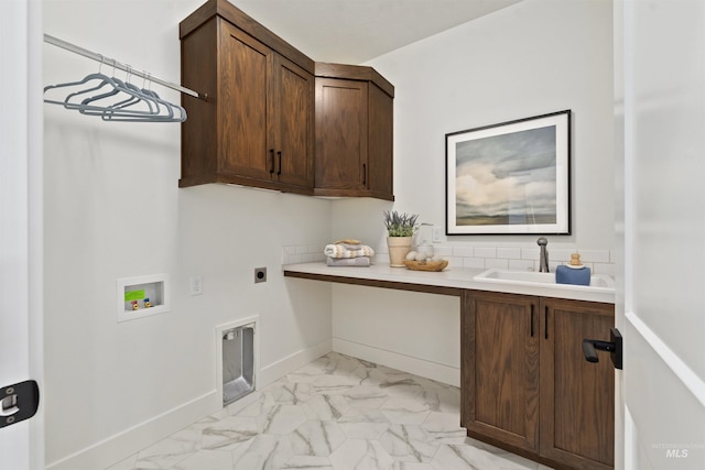 7766 W Daybreak Run Ct, Meridian, ID 83646 - laundry room with light marble finish floors, hookup for an electric dryer, cabinet space, and hookup for a washing machine