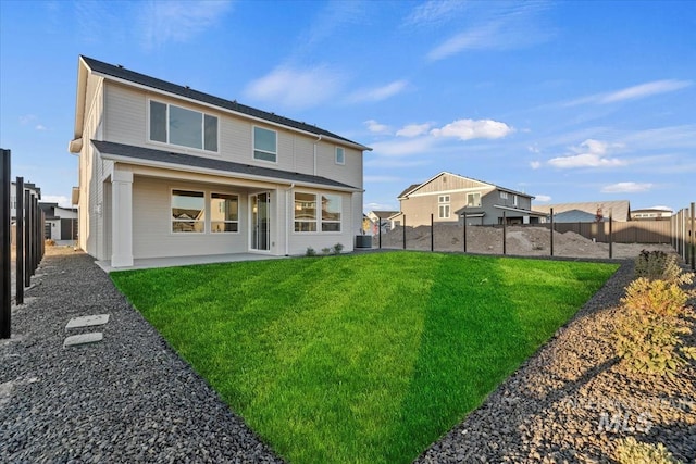 7766 W Daybreak Run Ct, Meridian, ID 83646 - back of house with a fenced backyard