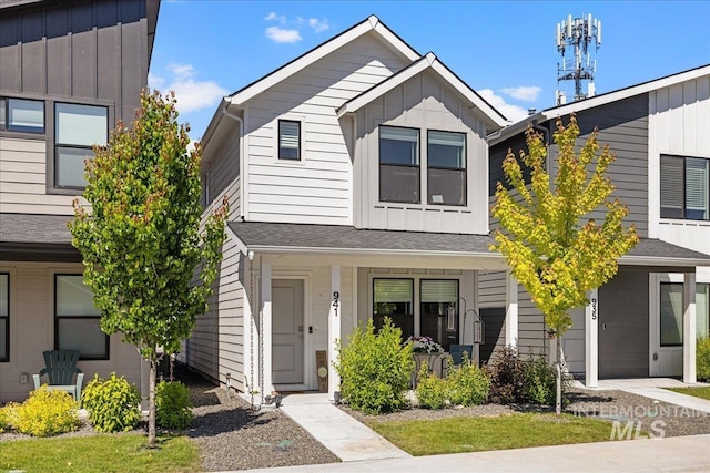 941 S Wavetrain Ave, Boise, ID 83709 - view of property with board and batten siding and a porch