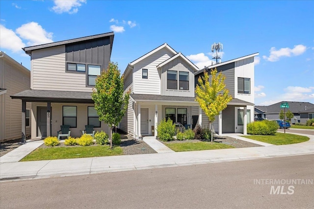 941 S Wavetrain Ave, Boise, ID 83709 - view of front of property with board and batten siding and covered porch