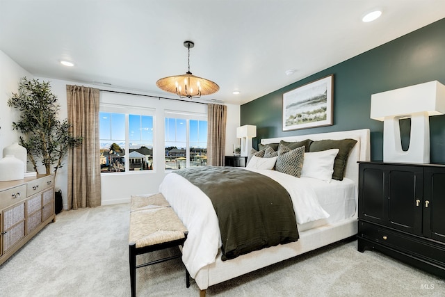 bedroom with light colored carpet