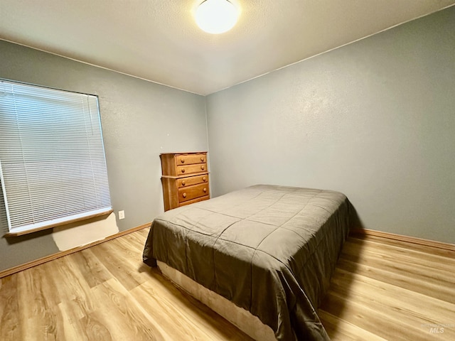 1089 Wallen Rd, Moscow, ID 83843 - bedroom with wood finished floors and baseboards