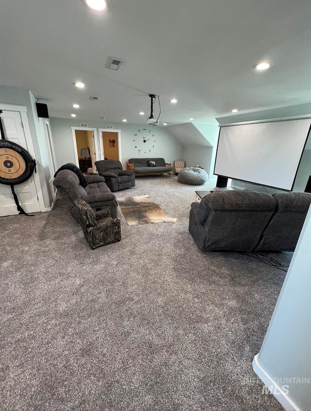carpeted living area with recessed lighting and visible vents
