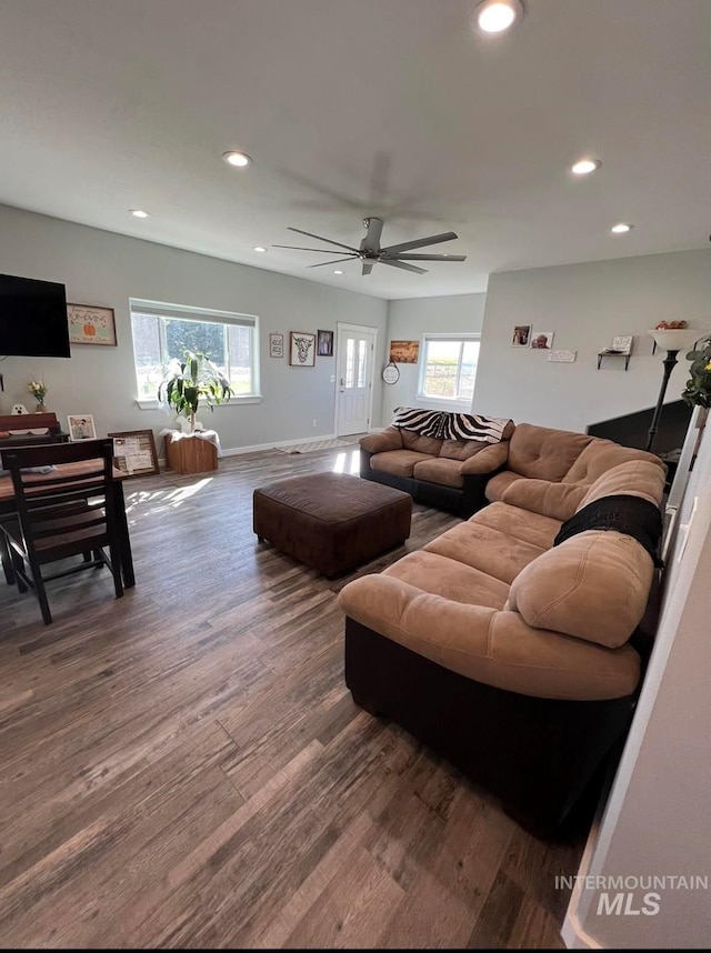 living room with dark wood-style flooring, recessed lighting, a ceiling fan, and baseboards