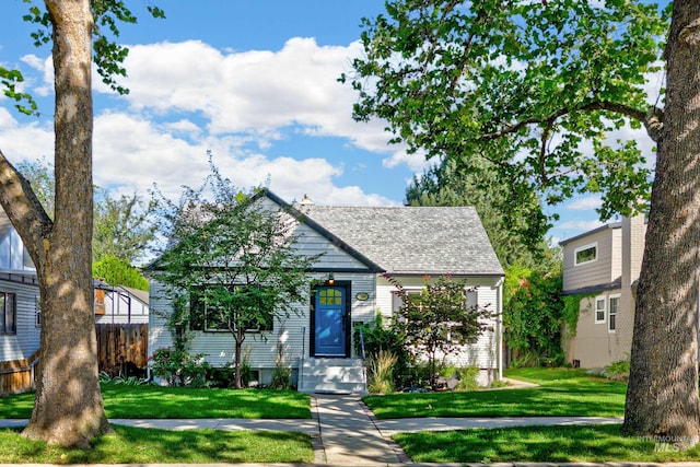 view of front of home with a front yard