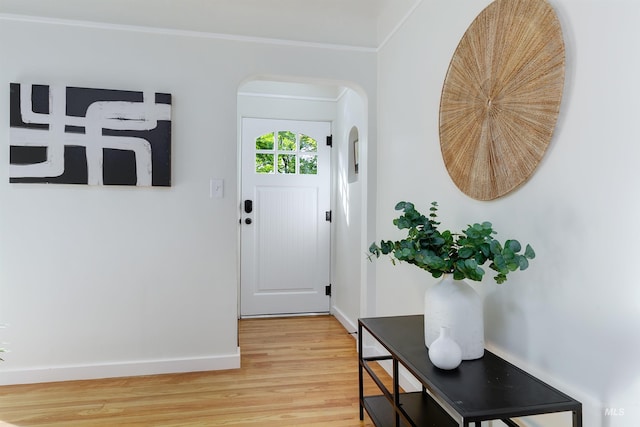 doorway with hardwood / wood-style floors