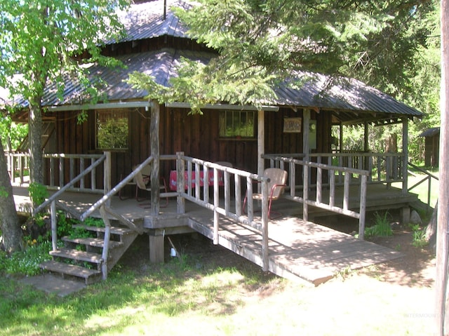 exterior space featuring a wooden deck