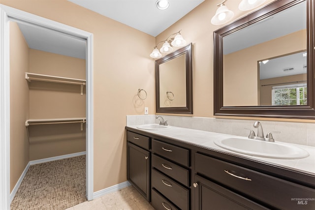 bathroom featuring vanity and tile patterned floors