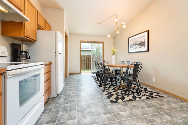 406 Margaret Way, Mccall, ID 83638 - dining room featuring lofted ceiling, a chandelier, and baseboards