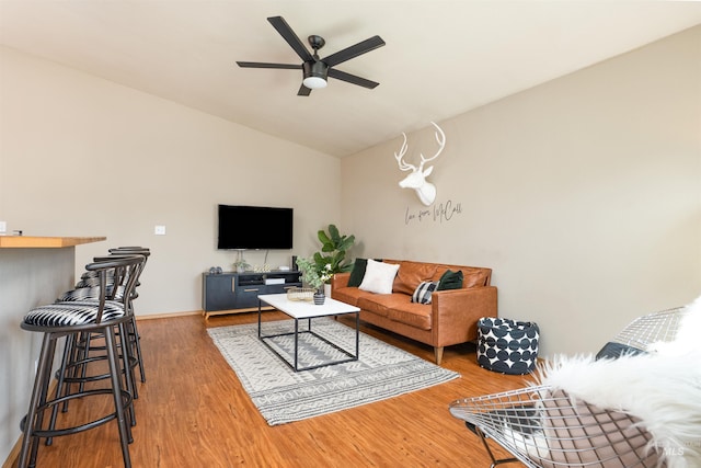 406 Margaret Way, Mccall, ID 83638 - living room featuring lofted ceiling, a ceiling fan, and wood finished floors