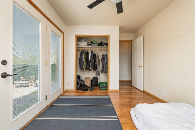 406 Margaret Way, Mccall, ID 83638 - bedroom featuring wood finished floors, baseboards, a ceiling fan, and a closet
