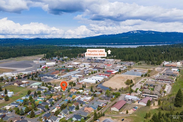 406 Margaret Way, Mccall, ID 83638 - aerial view of property and surrounding area featuring a heavily wooded area and a water and mountain view
