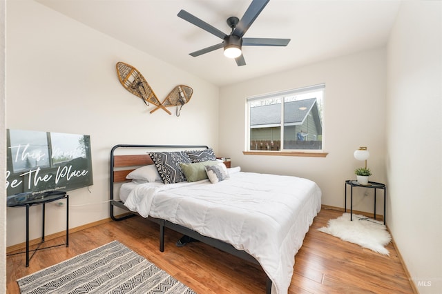 406 Margaret Way, Mccall, ID 83638 - bedroom with wood finished floors, baseboards, and a ceiling fan