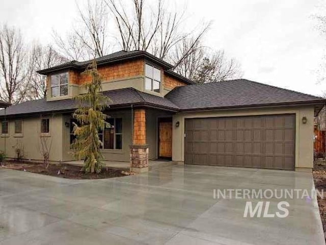 prairie-style home with a garage