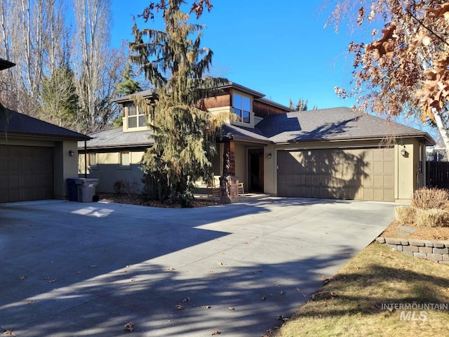 view of front of property featuring a garage