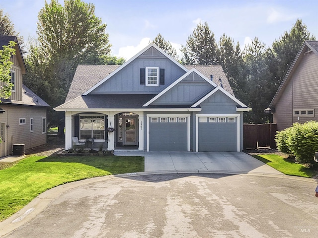1262 N Forestdale Pl, Eagle, ID 83616 - craftsman-style home with board and batten siding, driveway, a shingled roof, covered porch, and an attached garage