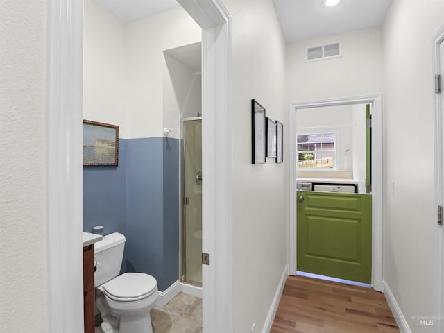1262 N Forestdale Pl, Eagle, ID 83616 - full bath with a stall shower, wood finished floors, and vanity