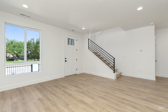 entrance foyer featuring light hardwood / wood-style flooring