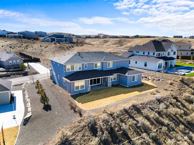 drone / aerial view featuring a residential view