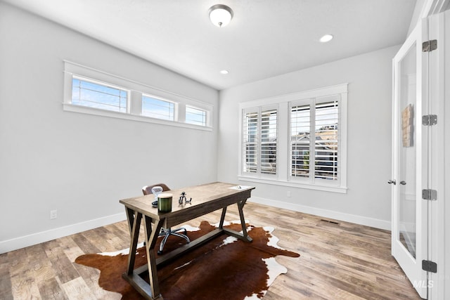 office area featuring recessed lighting, baseboards, and light wood-style flooring