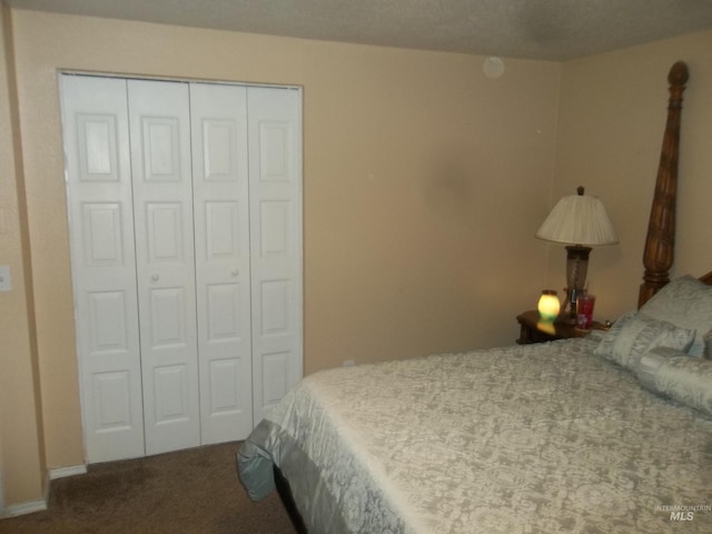 carpeted bedroom with a closet