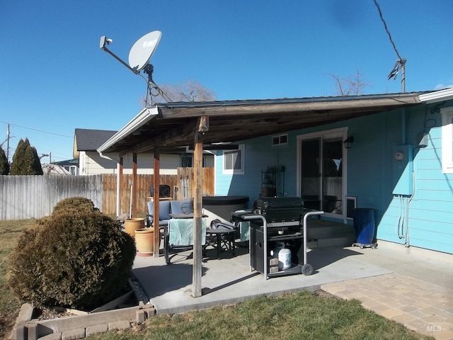 rear view of property with a patio