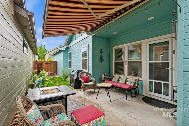 3931 N Park Crossing Ave, Meridian, ID 83646 - fenced backyard with a patio and an outdoor fire pit