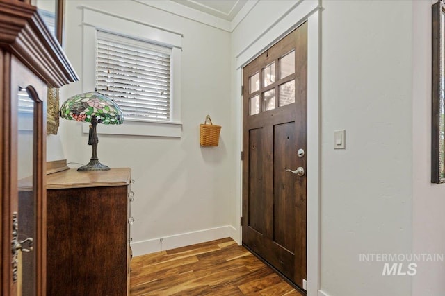 3931 N Park Crossing Ave, Meridian, ID 83646 - entryway featuring wood finished floors and ornamental molding