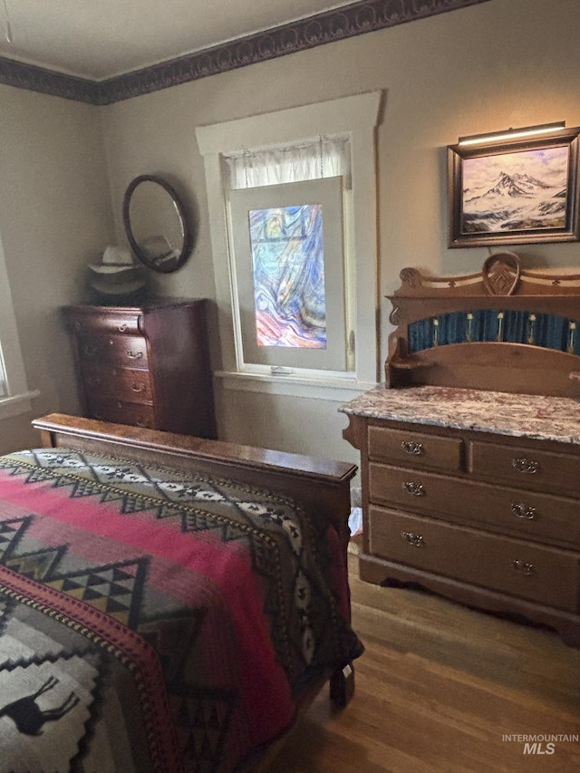 907 Prospect Ave, Lewiston, ID 83501 - bedroom with dark wood-style floors