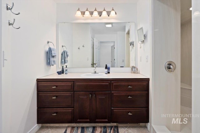 bathroom featuring vanity and tile patterned floors