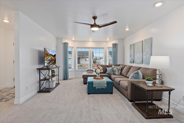 living area featuring recessed lighting, light colored carpet, ceiling fan, and baseboards