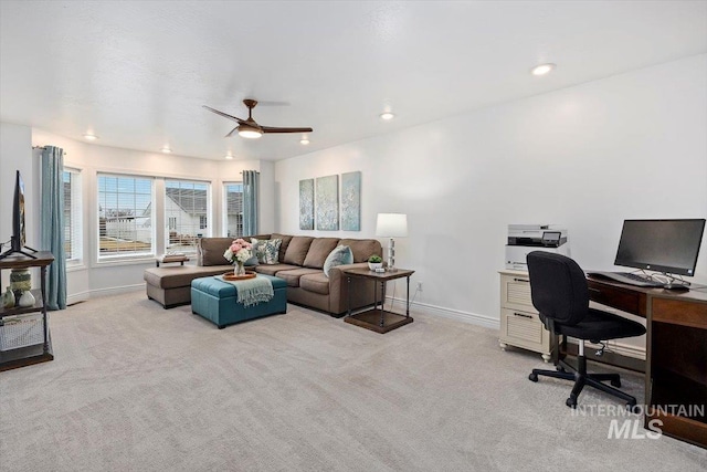 office space featuring baseboards, recessed lighting, a ceiling fan, and light colored carpet