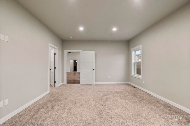 unfurnished bedroom featuring carpet floors