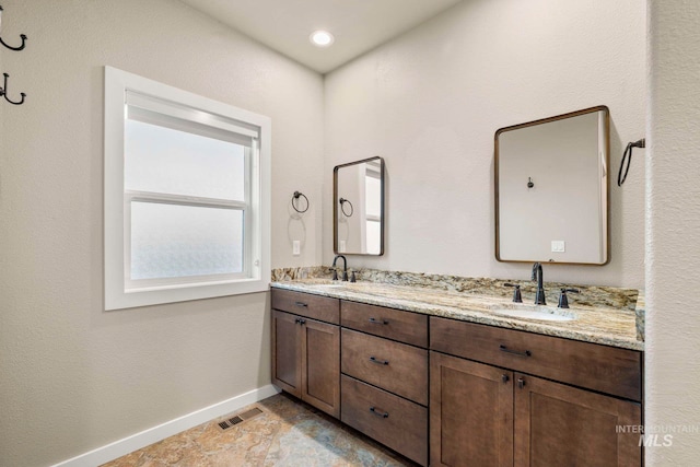 bathroom featuring vanity